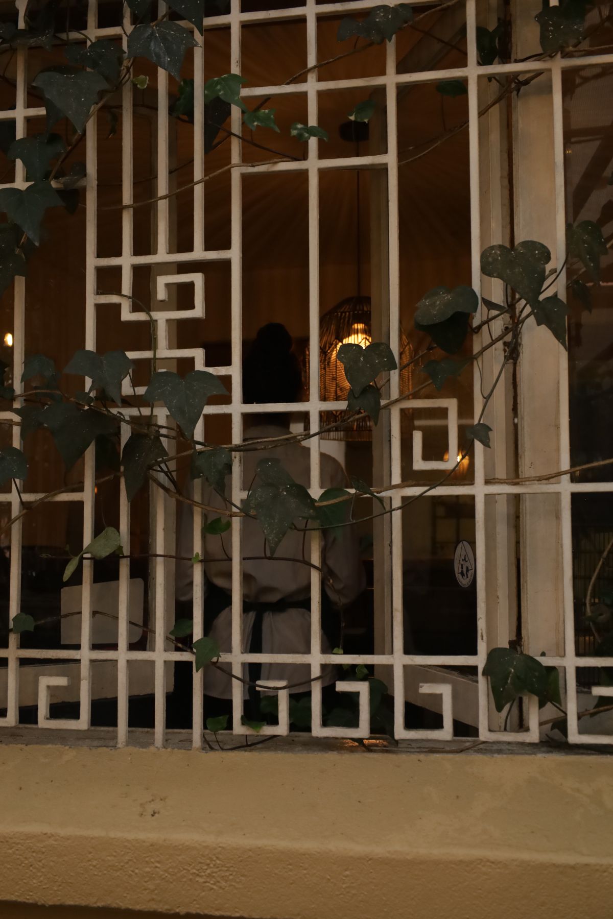 Ventana de PIANTA con hiedra